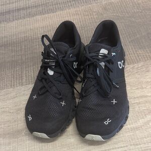 On Running Black and White Sneakers